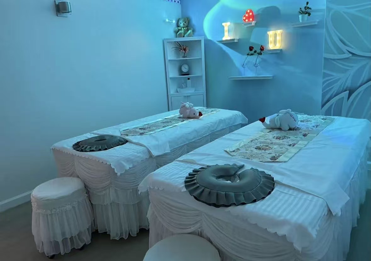 Blue-lit couples treatment room